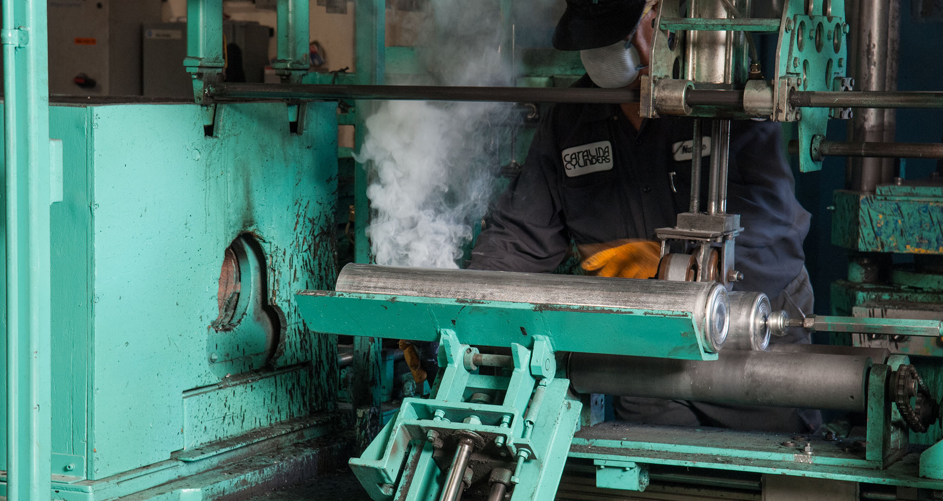 Catalina Cylinders operator running an impact extrusion press at the Garden Grove plant